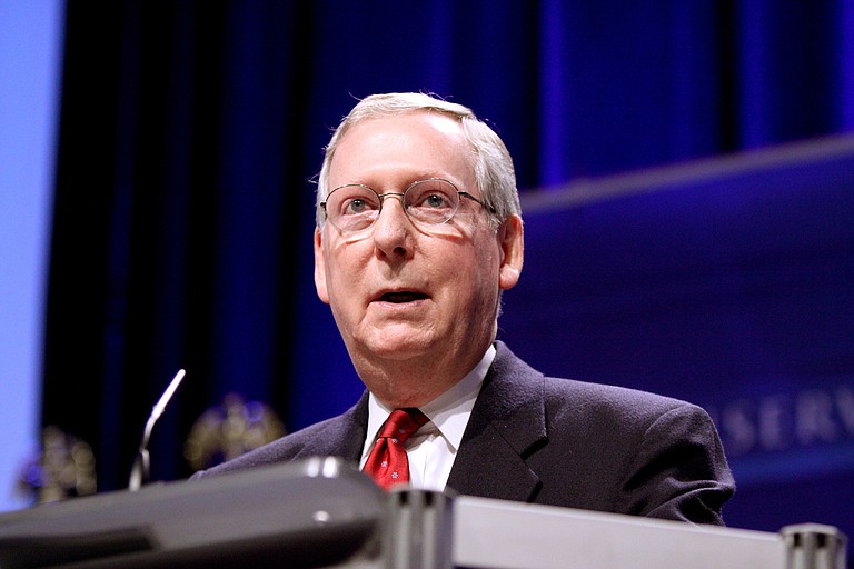 The looming government shutdown at midnight Thursday added urgency to the negotiations, conducted chiefly by the Senate's top leaders, Republican Mitch McConnell (pictured) of Kentucky and Chuck Schumer of New York. They met Tuesday morning in an effort to bring the talks toward closure. Photo courtesy Flickr/Gage Skidmore