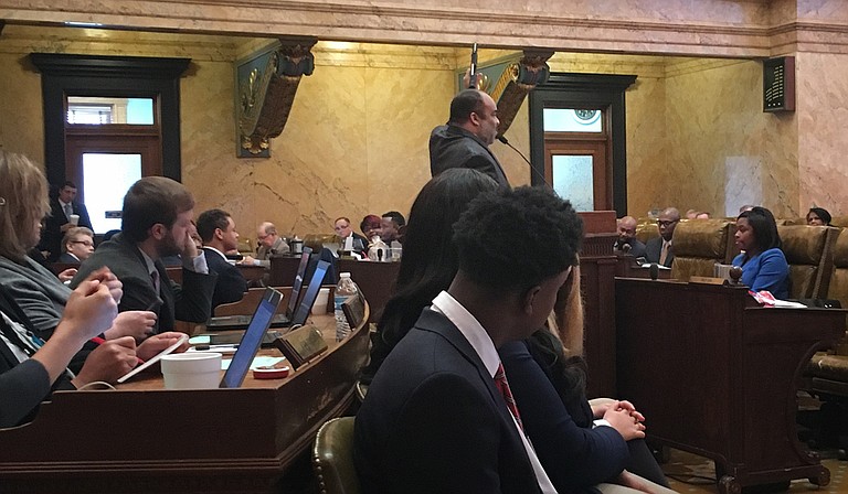 Rep. Charles Young, D-Meridian, brandished his unloaded gun on the House floor on Feb. 8, as he spoke on House Bill 1083, which would allow Mississippians with enhanced carry licenses to bring claims against public entities, including universities, with policies that prohibit them from carrying weapons on public property.