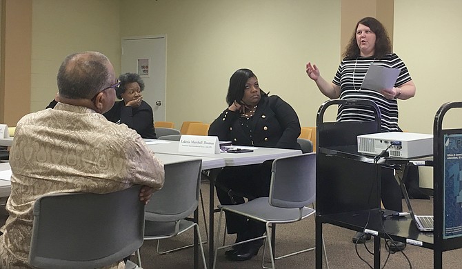Jennifer Johnson presented polling data from LJR Custom Strategies to the Better Together Commission. It showed that Jackson adults believe teachers are one of the best parts of Jackson Public Schools.