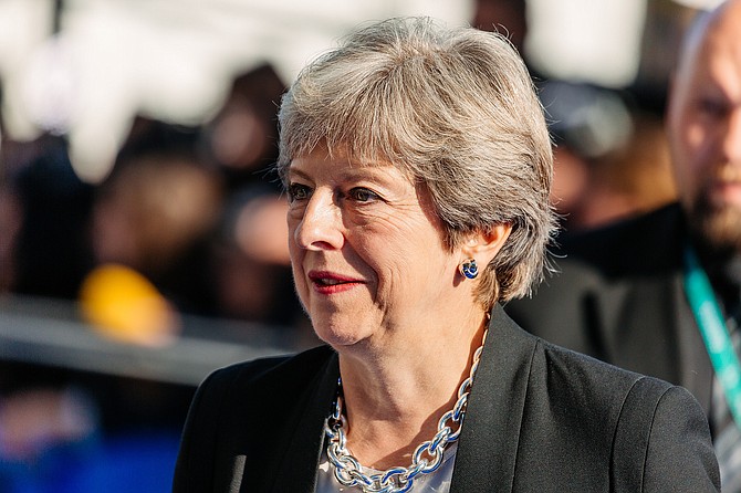 Prime Minister Theresa May told lawmakers that 23 Russian diplomats who have been identified as undeclared intelligence officers have a week to leave the country. Photo courtesy Flickr/Arno Mikkor
