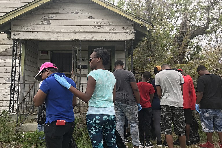 The family and friends of Lee Edward Bonner who died after JPD officers shot him on Feb. 21 gathered at the home where it took place to do a neighborhood cleanup on March 24, 2018, much like the ones Bonner organized when he was alive. Photo by Ko Bragg