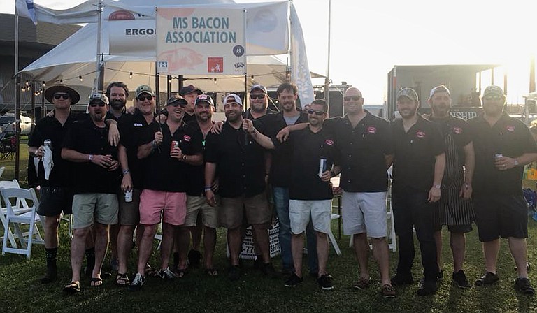 The Mississippi Bacon Association, a group of chefs and representatives of restaurants in Jackson and around the state, took home second place overall out of 85 teams that competed in a barbecue-themed fundraising event called "Hogs for the Cause" in New Orleans from March 22 to March 24. Photo courtesy Mississippi Bacon Association