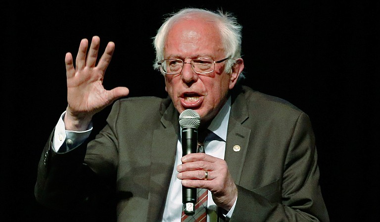 At the town-hall conversation between Sen. Bernie Sanders and Mayor Chokwe Antar Lumumba commemorating Martin Luther King Jr. on April 4, Sanders only spoke to national reporters who wrote stories about how he struggles with the African American vote. Photo courtesy AP/Rogelio V. Solis