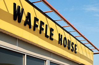 The suspect in a quadruple homicide at a Nashville Waffle House was taken into custody Monday, police said. Authorities had mounted a massive manhunt for 29-year-old Travis Reinking, after the Sunday morning attacks.