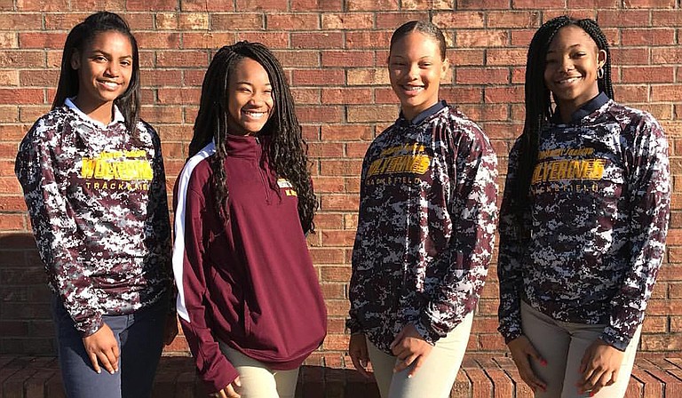 The Wolverines' 4x100 girls relay team, which consists of Mylani Galbreath (right), Jada Cavett (center left), McKinley Washington (center right) and Raylin Dixon (left), won the event in 51.11 seconds.