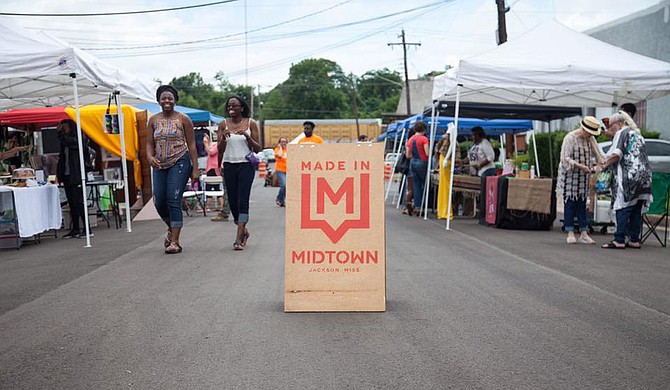 Midfest, an annual street festival and block party, showcases the local businesses and artists in Jackson’s midtown arts district.