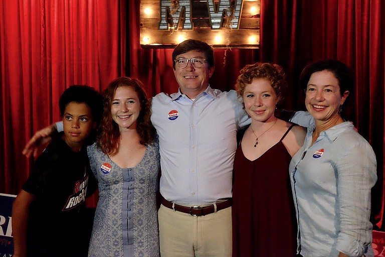 State Representative David Baria poses with his family after winning the Democratic primary runoff race to face Roger Wicker in a run for the U.S. Senate.