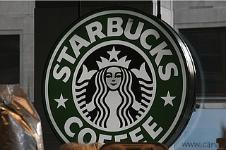 Starbucks will eliminate plastic straws from all of its locations within two years, the coffee chain announced Monday, becoming the largest food and beverage company to do so as calls for businesses and cities to cut waste grow louder.