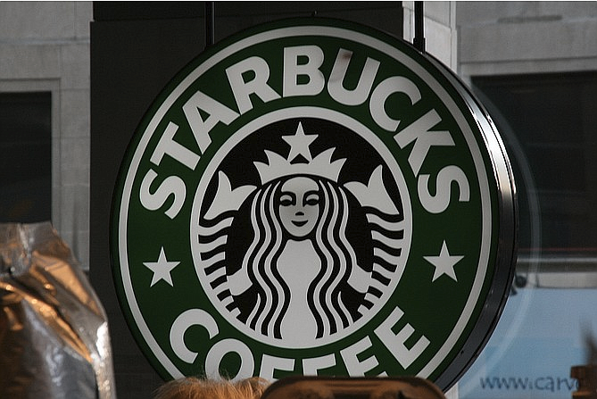 Starbucks will eliminate plastic straws from all of its locations within two years, the coffee chain announced Monday, becoming the largest food and beverage company to do so as calls for businesses and cities to cut waste grow louder.