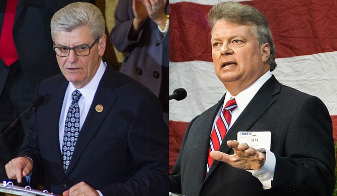 Gov. Phil Bryant (left) and Attorney General Jim Hood (right), along with Secretary of State Delbert Hosemann are defendants in a lawsuit alleging African American votes are diluted in State Senate District 22.