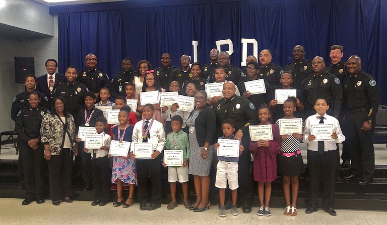 More than 20 children between the ages of 7 and 12 graduated from the Jackson Youth Citizens' Police Academy on July 13.