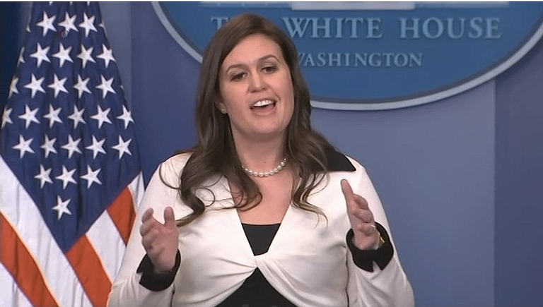 White House Press Secretary Sarah Huckabee Sanders, in her own statement, defended the decision and claimed that Collins had "shouted questions and refused to leave despite repeatedly being asked to do so" at the end of the Oval Office event.