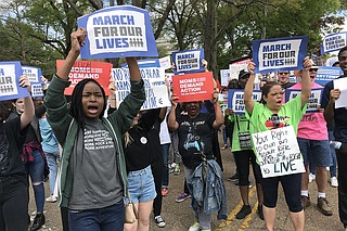 The survivors of the Parkland, Fla., shooting are touring the United States in a "March For Our Lives: The Road to Change" tour. They will be in Jackson on Aug. 2. Pictured here are local teenagers from an earlier march against gun violence.