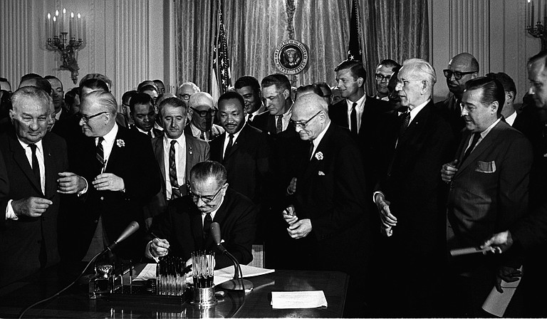 President Lyndon B. Johnson signed the Civil Rights Act of 1964, which included Title IV provisions to de-segregate public schools that the U.S. Supreme Court had ordered in 1954. However, it would take another high court decision in 1969 to force desegregation of all Mississippi schools.