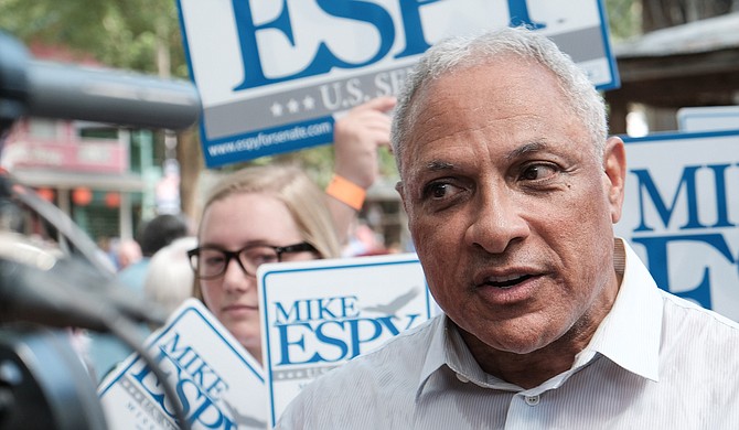 Democratic U.S. Sen. candidate Mike Espy—who is challenging incumbent Republican U.S. Sen. Cindy Hyde-Smith in a special election on Nov. 6—announced the opening of his campaign headquarters on Aug. 25, 2018. Seen here, Espy speaks to voters at the Neshoba County Fair on Aug. 2.