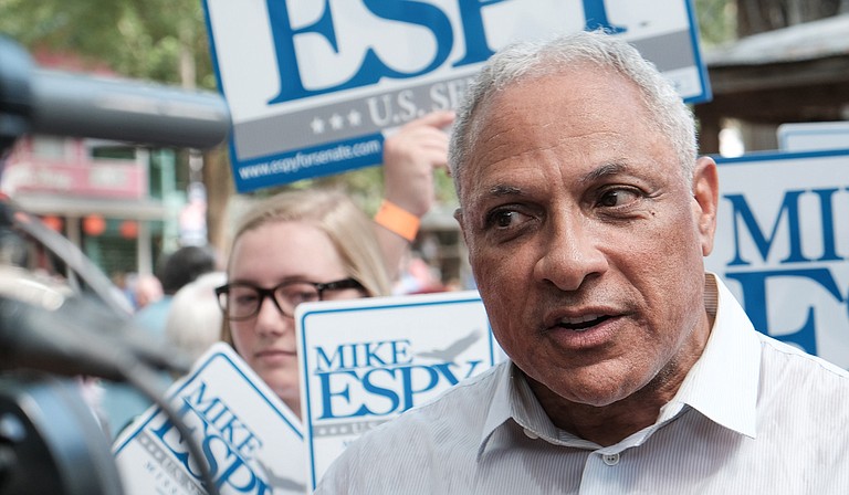Democratic U.S. Sen. candidate Mike Espy—who is challenging incumbent Republican U.S. Sen. Cindy Hyde-Smith in a special election on Nov. 6—announced the opening of his campaign headquarters on Aug. 25, 2018. Seen here, Espy speaks to voters at the Neshoba County Fair on Aug. 2.