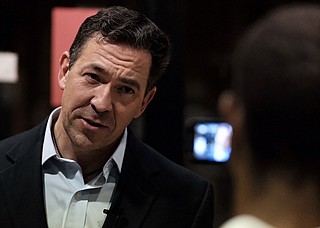 Mississippi U.S. Sen. candidate Chris McDaniel embraced President Trump's trade agenda and accused his opponent, incumbent Republican U.S. Sen. Cindy Hyde-Smith, of being weak on trade. Seen here on Aug. 30, McDaniel talks to a reporter at a town-hall campaign stop in Petal, Miss.