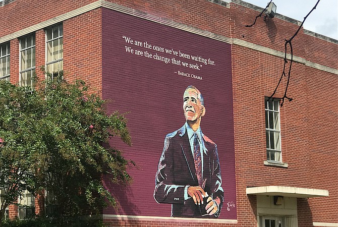 Jackson State University alumni Charles and Talamieka Brice unveiled a mural depicting former President Barack Obama, which the husband-and-wife design team painted along the south wall of Barack Obama Magnet IB Elementary School in Jackson, on Friday, Aug. 17.