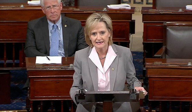 U.S. Sen. Cindy Hyde-Smith gives her maiden speech on the Senate floor in defense of Brett Kavanaugh, President Trump's Supreme Court nominee, on Sept. 26, 2018. Mississippi’s other senator, Roger Wicker, sits behind her. Screencap via Hyde-Smith's YouTube page