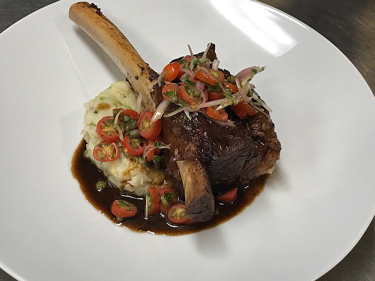 Chef Simon Brown received his "Culinary Innovator" title in honor of a new dish he created that he calls the "short rib tomahawk," which will appear on Seafood R'evolution's menu in November. Photo courtesy Seafood R'evolution
