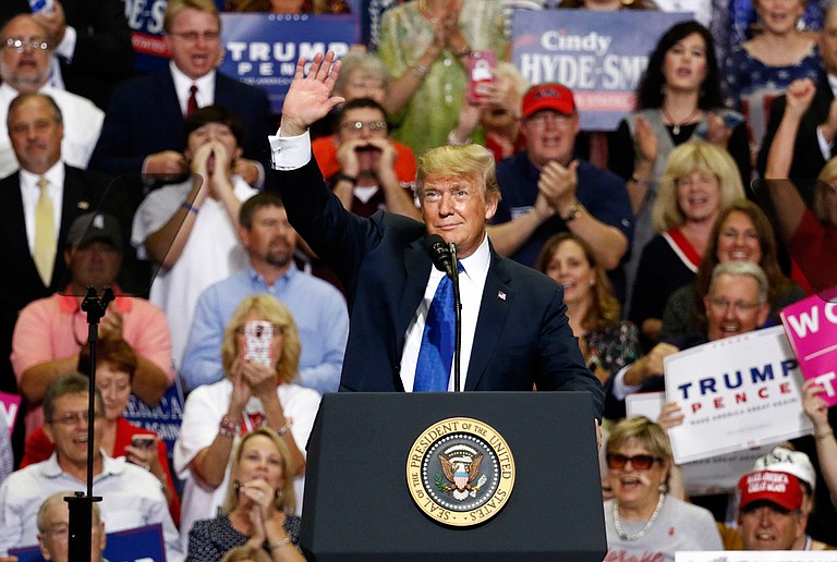 The audience laughed as Trump ran through a list of what he described as holes in Christine Blasey Ford's testimony before the Senate Judiciary Committee. She testified that Kavanaugh pinned her on a bed, tried to take off her clothes and covered her mouth in the early 1980s, when the two were teenagers. Kavanaugh has denied Ford's allegations. Photo courtesy Rogelio V. Solis/AP