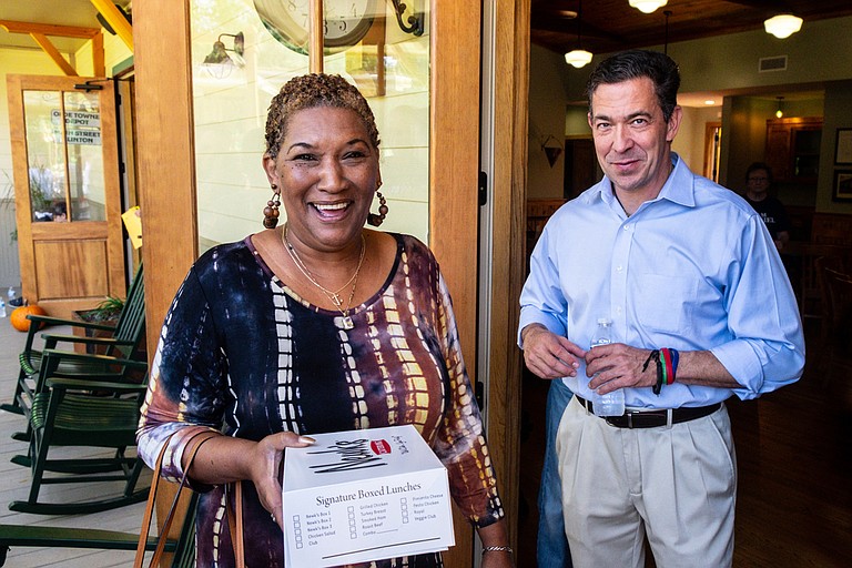 U.S. Senate candidate Chris McDaniel speaks with Wanda Evers, niece of slain civil-rights leader Medgar Evers, at a campaign event in Clinton, Miss., on Oct. 13, 2018.