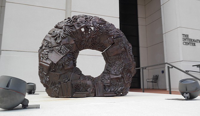 "Eudora Welty Wreath," the iron sculpture that Tordella-Williams created for the exhibition, features castings of handprints from patrons of the Eudora Welty Library in Jackson, as well as cast-off books from a book sale at the library. Photo courtesy Millsaps College