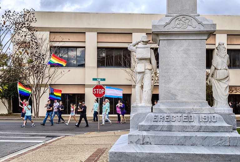 LGBT rights advocates mar ch past a Confederate monument on Main Street in Hattiesburg, Miss., at the third annual Southern Fried Pride on Nov. 18, 2017. Among major Mississippi cities in HRC's equality index, Hattiesburg is second after Jackson.