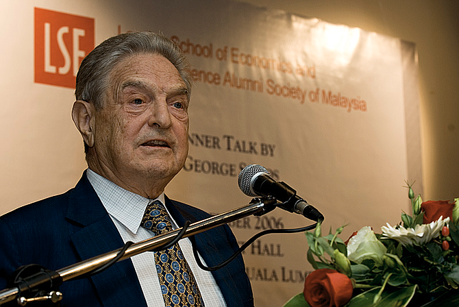 George Soros, who made his fortune in hedge funds, frequently donates to liberal causes. Recently, conservative critics have accused him without evidence of secretly financing the caravan of Central American migrants making their way toward the U.S. Photo courtesy Wikimedia Commons/Jeff Ooi