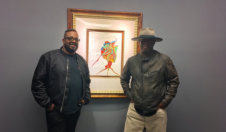 (Left to right) Erin Davis and Vince Wilburn Jr., the youngest son and nephew of iconic trumpet-player Miles Davis, attended the opening reception for "We're Miles Ahead: The Miles Davis Exhibition," which is on display at Jackson State University's downtown campus through Nov. 30.