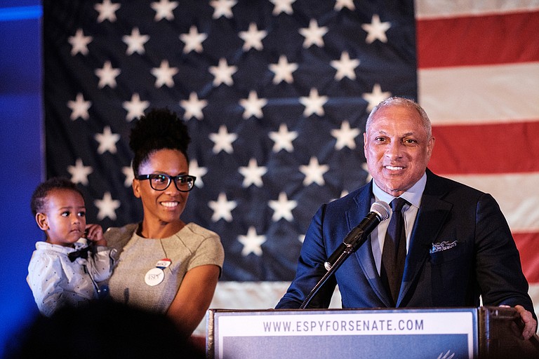 U.S. Sen. Cindy Hyde-Smith accused her Democratic opponent, Mike Espy (pictured here with daughter Jamilla Espy and his grandchild), of “mansplaining” after he said he would be better for women. Photo by Ashton Pittman