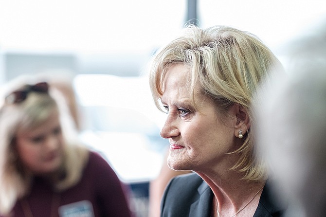 "Cindy Hyde-Smith's comments have inflamed our nation for one simple fact: It's because we expect more. We know that our elected representatives and officials have to be better than this." —Duvalier Malone; photo of Gov. Phil Bryant (left) and Cindy Hyde-Smith (right) taken by Ashton Pittman at a rally in Hattiesburg on Nov. 5