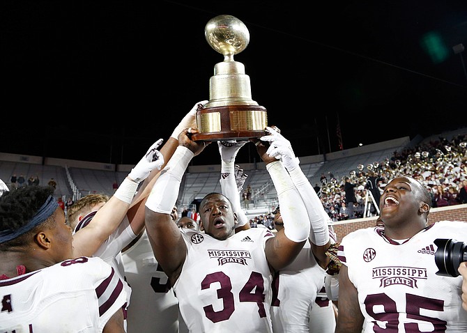 Mississippi State University topped Ole Miss 35-3 during the Egg Bowl on Thanksgiving Day. Photo by AP Photo/Rogelio V. Solis
