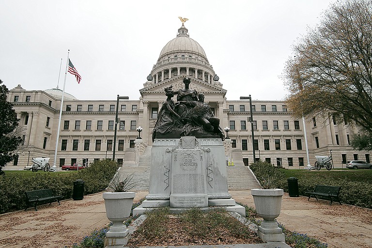 A Mississippi official says two nooses and six signs were found on the grounds of the Mississippi state Capitol.