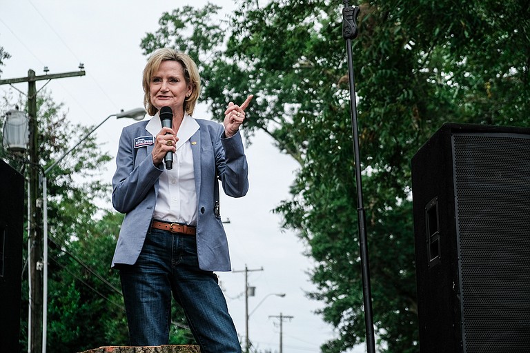 Republican U.S. Sen. Cindy Hyde-Smith returns to Washington as a solidly loyal supporter of President Donald Trump after he stumped for her in a divisive Mississippi runoff shaped by her video-recorded remark about "public hanging."