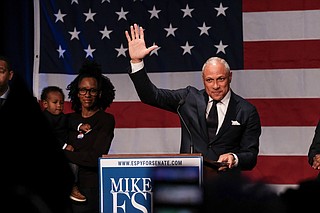 Democrat Mike Espy waves to his supporters after conceding to U.S. Sen. Cindy Hyde-Smith on Nov. 27.