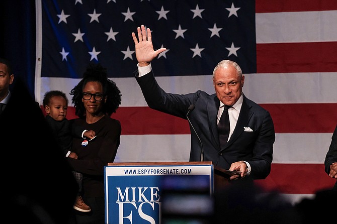 Democrat Mike Espy waves to his supporters after conceding to U.S. Sen. Cindy Hyde-Smith on Nov. 27.
