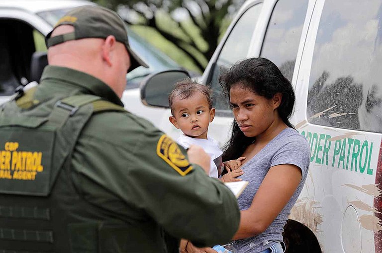 Two refugee children died in U.S. Border Patrol custody in December after the Trump administration made it increasingly difficult for refugee families seeking asylum to enter the country legally. Photo by David J. Phillip/AP