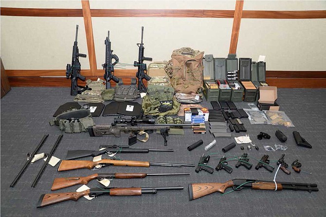 Federal agents found 15 firearms—including several rifles—and over 1,000 rounds of ammunition inside Hasson's basement apartment in Silver Spring, Maryland. Photo courtesy U.S. District Court via AP
