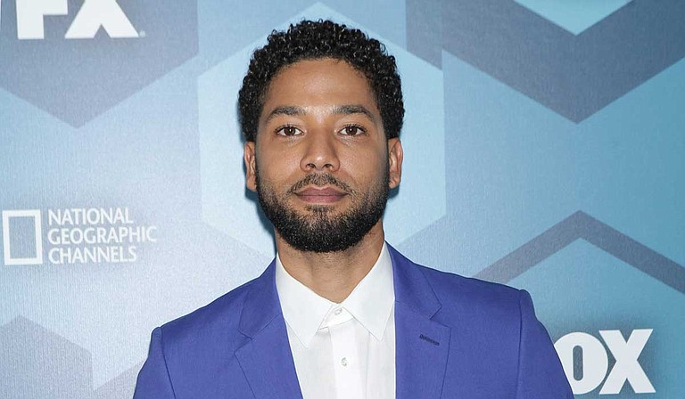 "Empire" actor Jussie Smollett turned himself in early Thursday to face accusations that he filed a false police report when he told authorities he was attacked in Chicago by two men who hurled racist and anti-gay slurs and looped a rope around his neck, police said. Photo courtesy Diego Corredor/MediaPunch/AP
