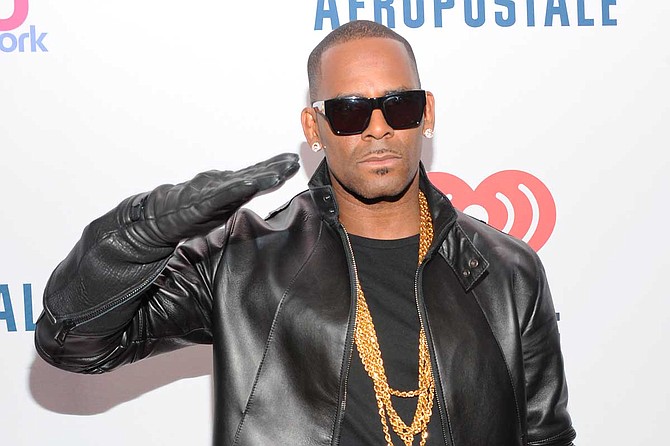 R. Kelly was charged Friday with 10 counts of aggravated sexual abuse, after decades of lurid rumors and allegations that the R&B star was sexually abusing women and underage girls. Photo courtesy Jon Palmer/MediaPunch, Inc.
