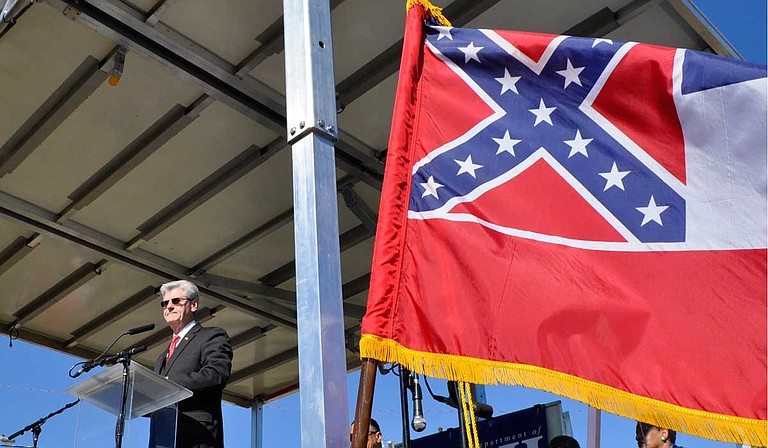 Gov. Phil Bryant spoke at the groundbreaking of Mississippi's Civil Rights Museum in 2013, joined by Myrlie Evers-Williams, who was the wife of slain civil-rights activist Medgar Evers. On March 14, 2019, he credited Mississippi's two white Republican U.S. senators for a law declaring the Evers' home a national monument, but did not credit Rep. Bennie Thompson, a black Democrat who pushed for the law for 16 years. File Photo by Trip Burns
