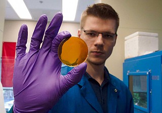 Witold Fuchs, a third-year polymer science doctoral student at the University of Southern Mississippi, is partnering with NASA to design a carbon fiber composite material and test using it to construct hulls for spaceships and satellites. Photo by J'Marcus Alfred/USM