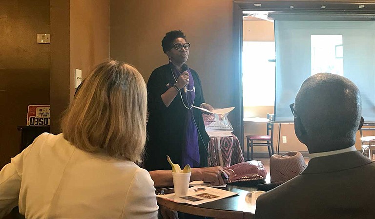 Willie Jones, president of Women for Progress, speaks to an audience at the Refill Cafe about dispeling voter apathy and reforming the voting process in Mississippi.