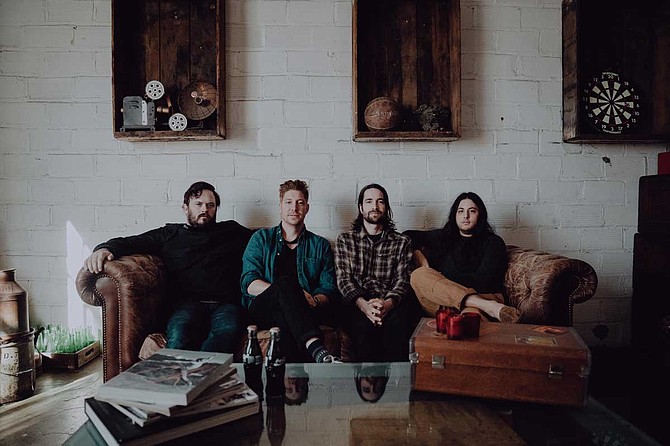 (Left to right) Aaron Lunsford, T.J. and Cody Bonnette and Hunter Walls of As Cities Burn perform Wednesday, June 12, at Duling Hall. Photo by Alex Bemis