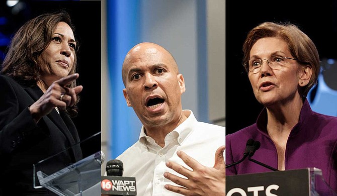 U.S. Sen. Cory Booker, center, joined two other 2020 Democratic candidates, Sens. Kamala Harris, left, and Elizabeth Warren, right, in calling for Donald Trump's impeachment.