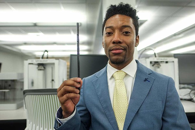 LaMonté Pierce, a graduate student at Jackson State University who is majoring in technology education, recently secured a patent for a special straw that he dubbed the “Cleanstraww,” which filters lead and other contaminants from water a person drinks through it. Photo by Charles A. Smith/JSU