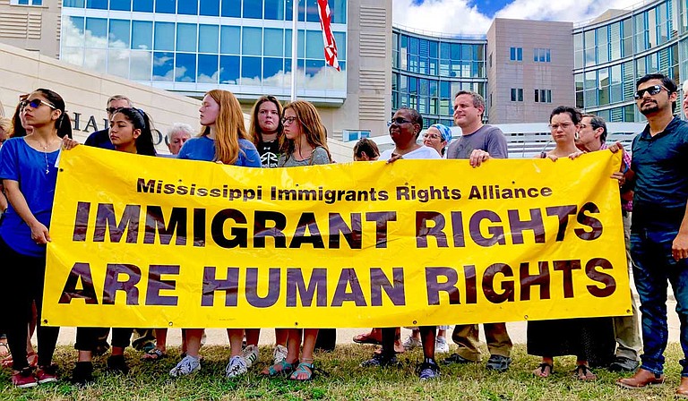 Immigrants rights activists protested against the Trump administration's decision to open immigrant detention facilities in Mississippi outside the U.S. District Court court building in Jackson on July 12, 2019.