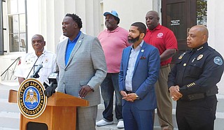 Parks and Recreation Director Ison B. Harris Jr. talks about the Peace in the Street 3- on-3 basketball tournament on Aug. 17 at a July 23 press conference outside Jackson City Hall. Photo by Josh Wright