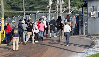 PH Food is one of seven Mississippi plants raided Aug. 7. Federal agents arrested 680 people accused of working illegally, including 99 at PH Food. Photo by Rogelio V. Solis via AP